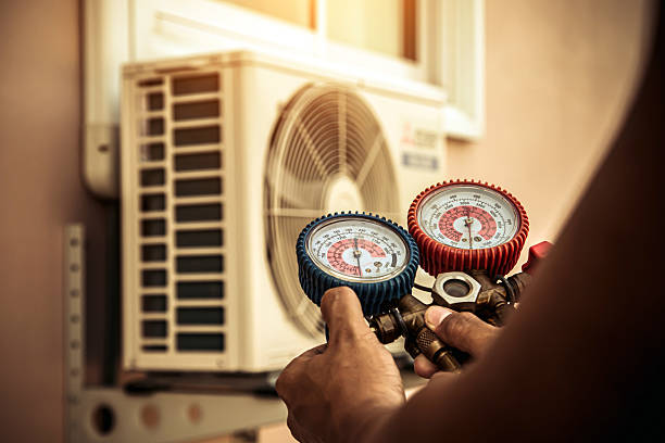 Professional Hvac technician working in Hamlet, IN